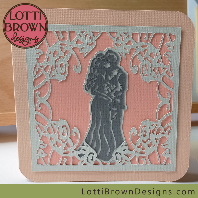 Lacy-cut wedding card design in pretty peach